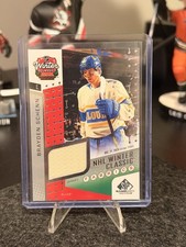 2025-26 SP GAME USED BRAYDEN SCHENN NHL WINTER CLASSIC FABRICS BLUES 