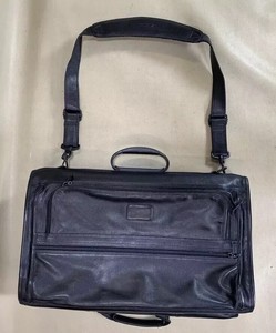 tumi leather handbag
