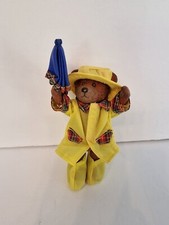 Vintage Paddington Bear in yellow raincoat, boots and hat, toys plastic figurine