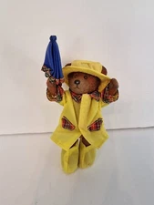 Vintage Paddington Bear in yellow raincoat, boots and hat, toys plastic figurine