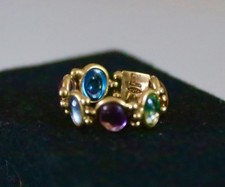 Italian 18 kt Gold and Semi Precious Cabochon stone Eternity Ring.
