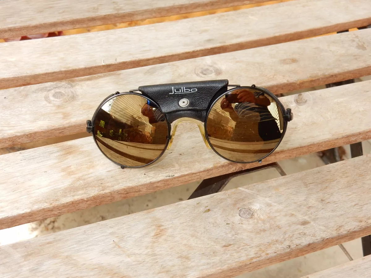 Premium Photo | Vintage mountain sunglasses on the table