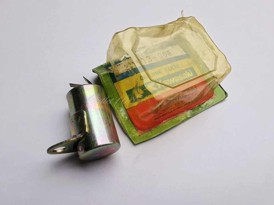 Condensador condensador NOS genuino OEM Kawasaki KE100 KH100 G7 G3 SS G3TR G4TR KD80 Foto 2 de 4