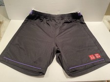 Medium Uniqlo Roger Federer Tennis Shorts Black with Purple Trim. New with Tags.