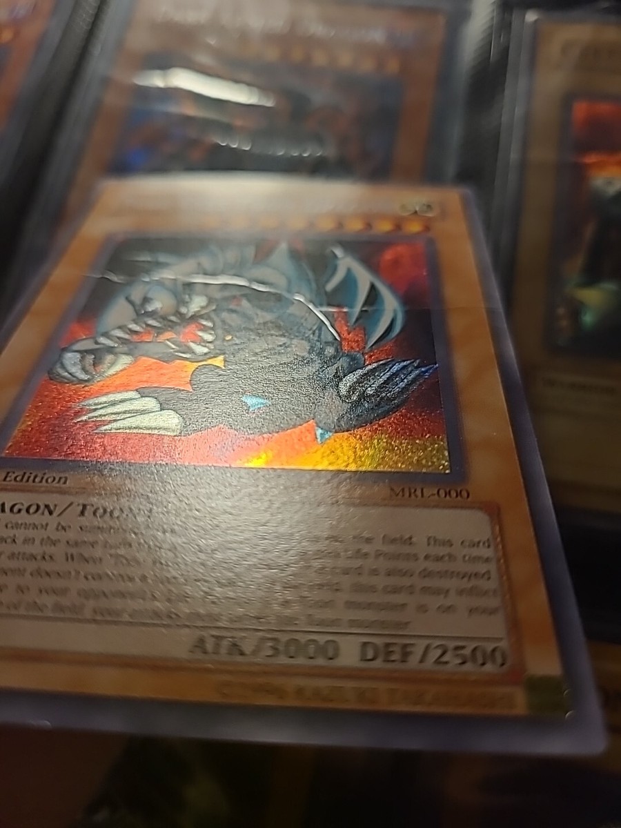 Blue-Eyes Toon Dragon MRL-000 1st Edition Secret Rare Wavy Print