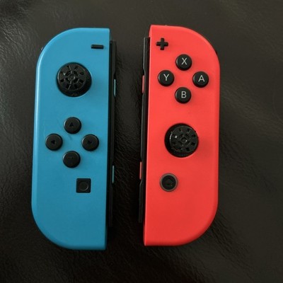 Nintendo Switch Joy-Con Wireless Controllers Neon Red and Neon Blue Pair WORN