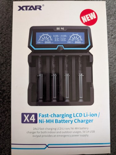 XTAR X4 Fast Charging LCD Li-ion/Ni-MH Battery Charger. Brand New.