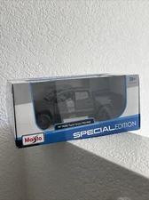 2023 TOYOTA TACOMA TRD PRO PICKUP TRUCK BLACK 1/27 DIECAST CAR MAISTO 32910BK