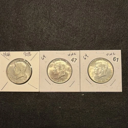 LOT OF 3 1964 BRILLIANT UNCIRCULATED KENNEDY SILVER HALF DOLLAR COINS.