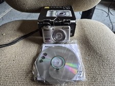 Nikon Coolpix L27 Digital Camera 16.1MP 5x Zoom 2.7 LCD Silver Tested