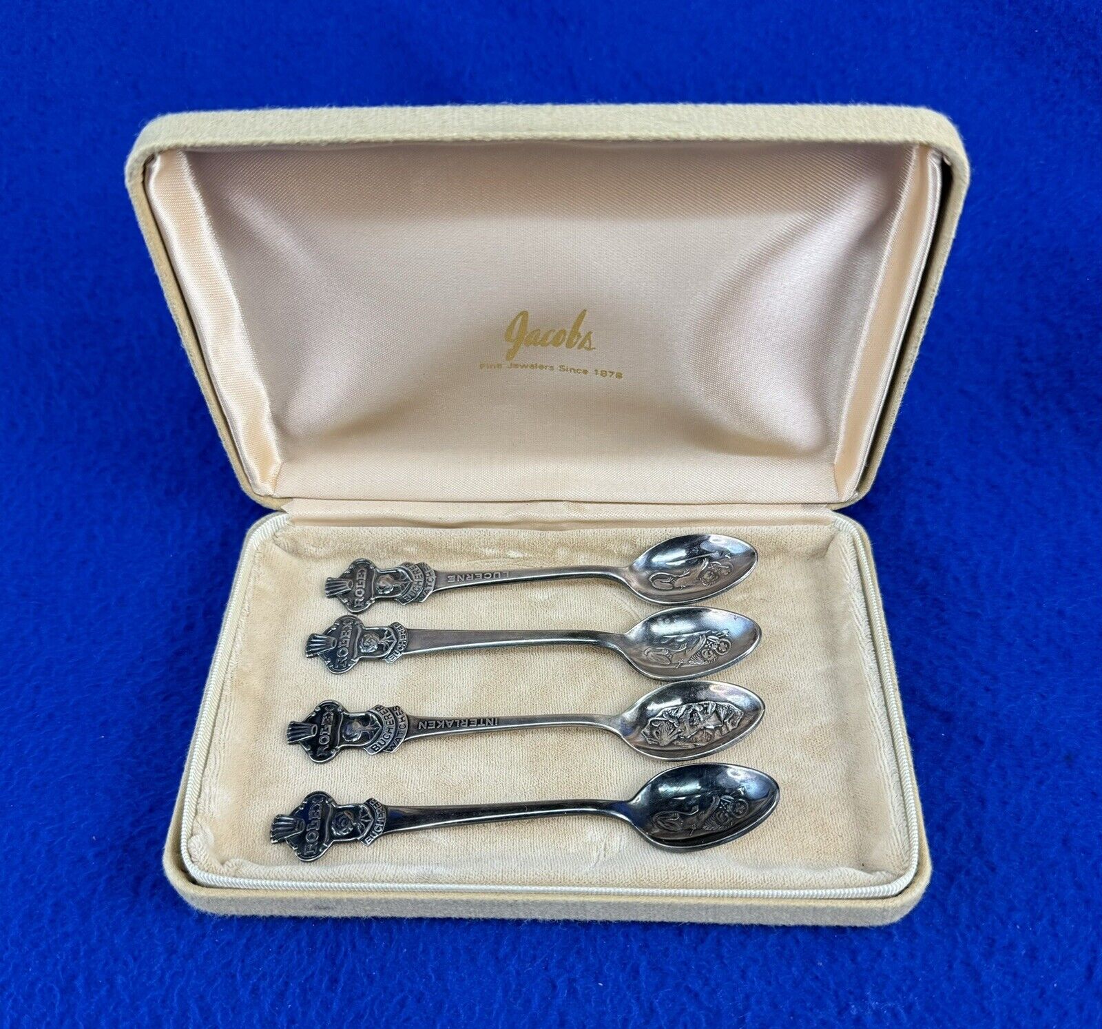 4 Souvenirs Spoons with Rolex Sign In a Box
