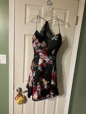 B. Smart black floral cocktail party dress size 9 flirty full skirt side pockets