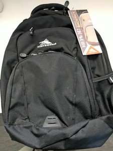 black backpack with compartments