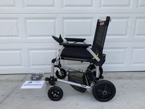 Zoomer chair Compact folding Power wheelchair | eBay