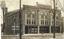 Lowville NY -- Opera House/Town Hall, dirt road; nice 1910s RPPC