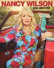 Nancy Wilson Sitting in Car with Guitar 8x10 Picture Celebrity Print