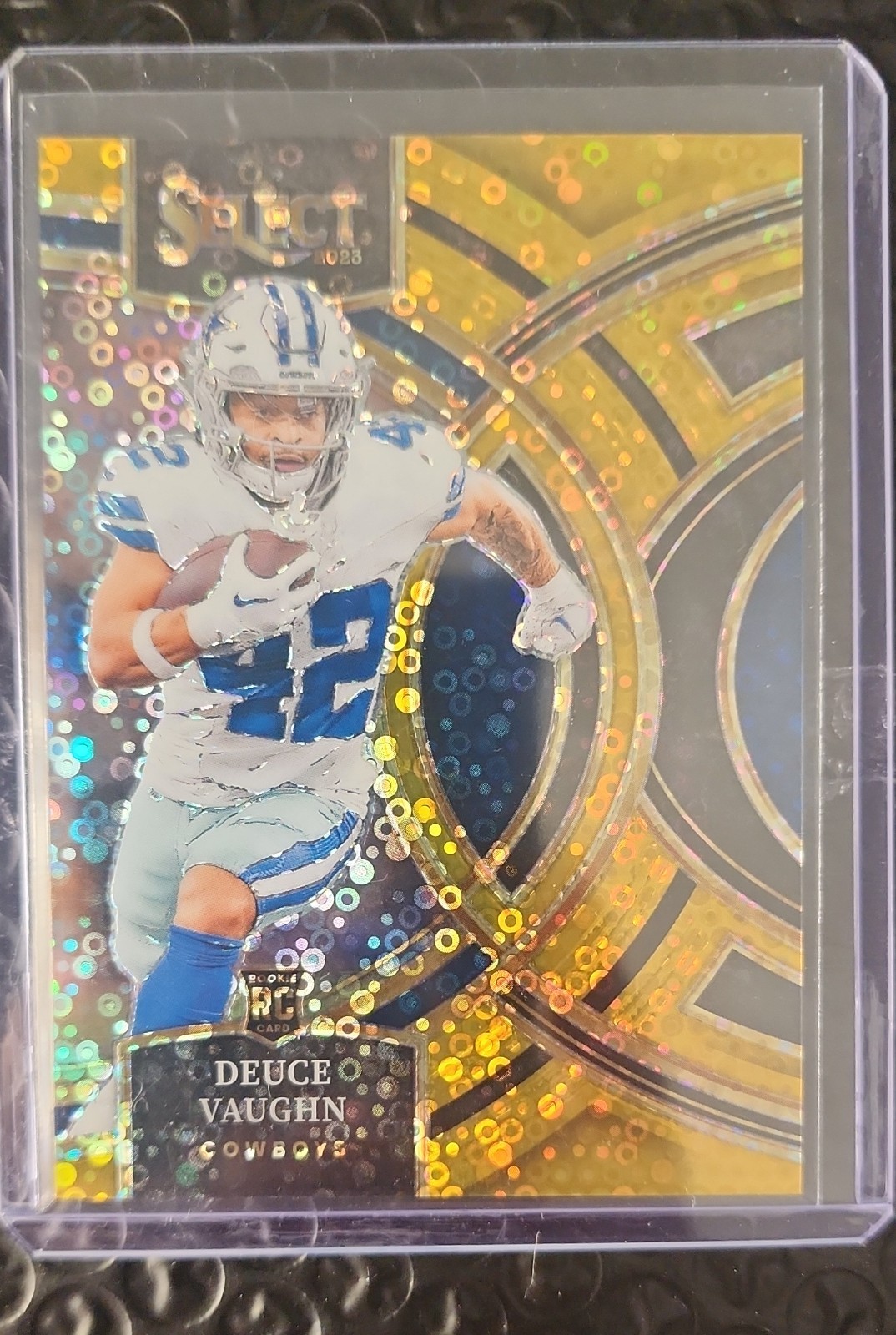 2023 Panini Select - Premier Level Deuce Vaughn #128 Gold Disco Prizm /10 (RC)