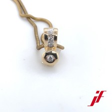 Anhänger in 585/- Gelbgold mit 4 Diamanten ca. 0,09 ct. Wesselton/SI