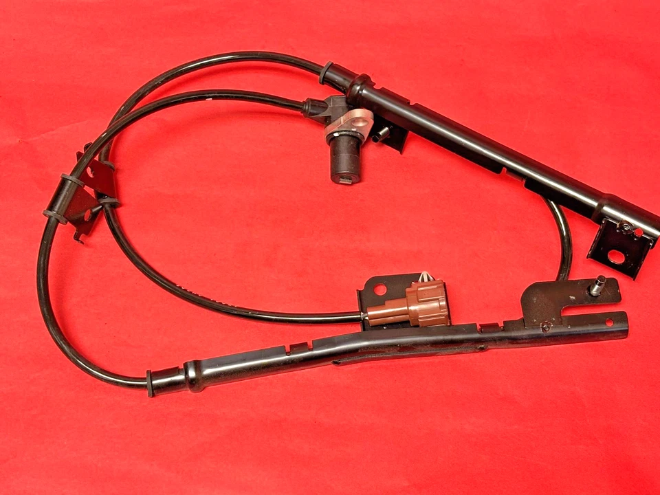 Sensor de velocidad de rueda ABS OEM ALS303 para Nissan Pathfinder Infiniti QX4 trasero izquierdo Foto 2 de 4