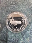 1 oz silver round American Fishing Club Tarpon. Will Combine Fishing.