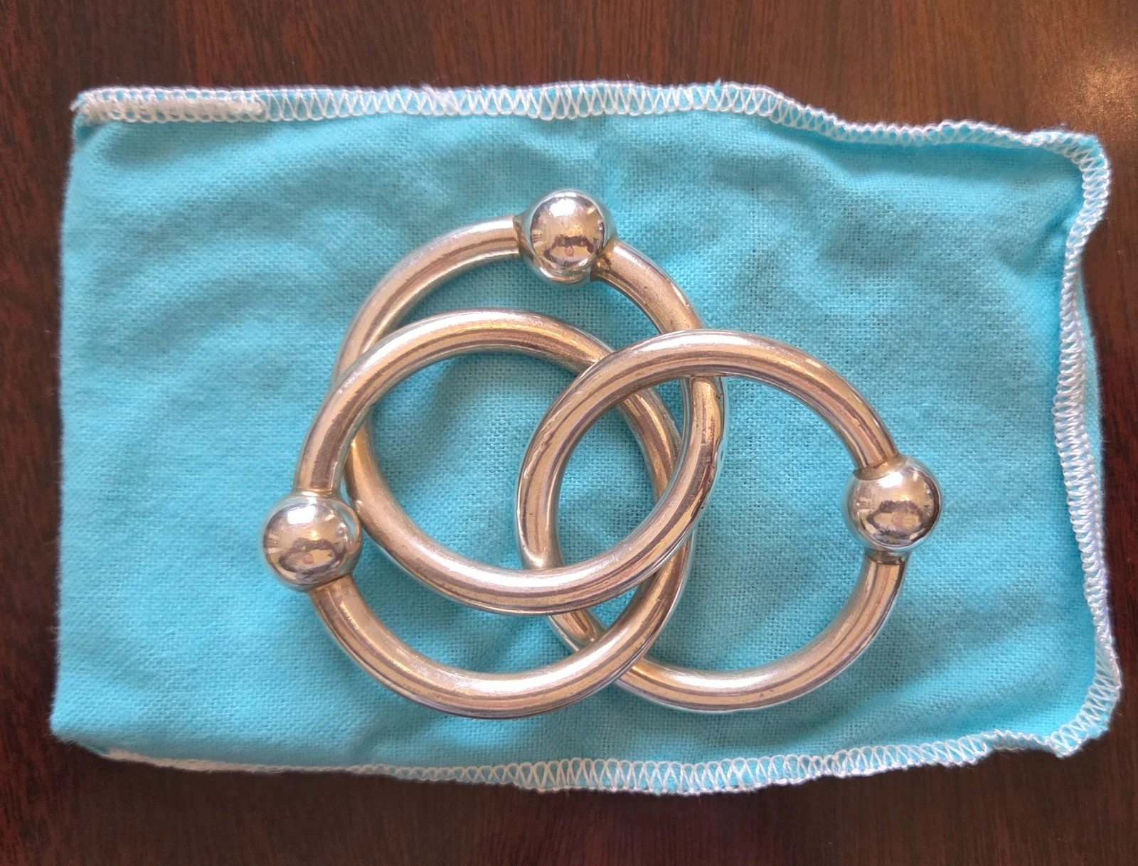 Tiffany & Co Sterling Silver Baby Teething Ring - 3 Ring Rattle
Opens in a new window or tab