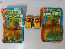 Lot 4 1980's Sesame Street Big Bird's convertible Bert's Elmo's Taxicab diecast