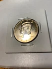 1997-D Kennedy Half Dollar – Beautiful Golden Toning –