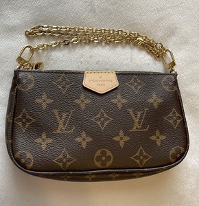 louis vuitton clutch wristlet