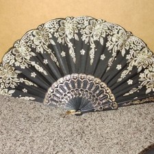 Black and Gold Decorative Hand Fan Plastic Fabric with Gold Floral Detailing