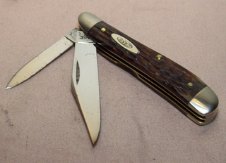 1950 to 1964 CASE XX UNUSED 6220 PEANUT 2 BLADE ROGERS JIGGED BROWN BONE KNIFE