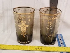 WORN Set of two black and gold Moroccan tea glasses, juice glass, small cup