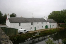 Photo 12x8 Bridgend Shopping Bridgend/Beul an Atha A rear view of the pos c2011