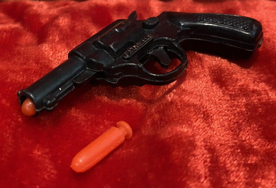 Jouet Vintage Mini-Patroller 1970s – Plastique Noir à Ressort – Fabriqué à Hong Kong
