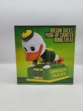 The Oregon Duck Oregon Ducks Push-Up Counter Bobblehead NCAA College
