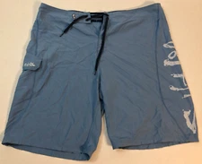 Salt Life SLX-QD Sz 38 Quick Dry Men's Board Shorts Light Blue Skull Print