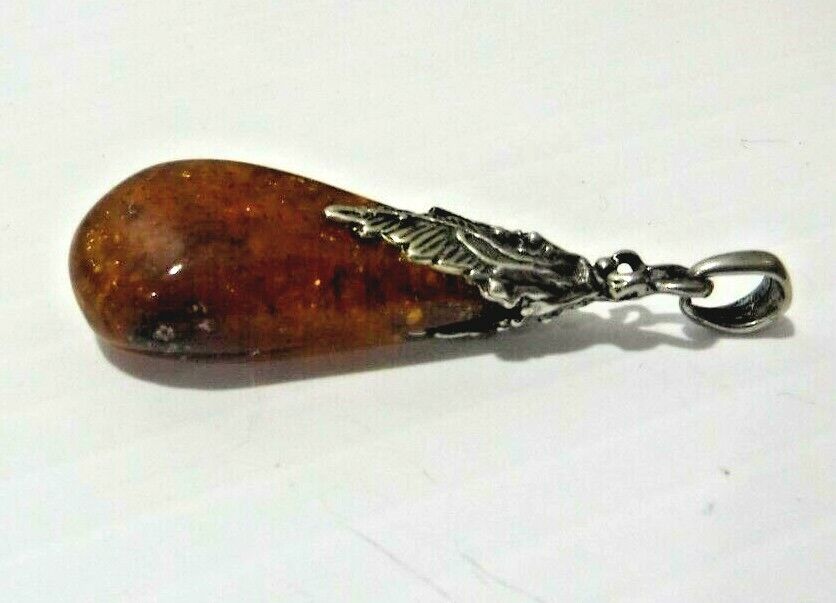 Amber Pendant Set in Sterling Silver 1 1/2 In. Long  3/4 In. Wide