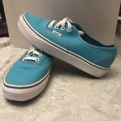 light blue vans off the wall