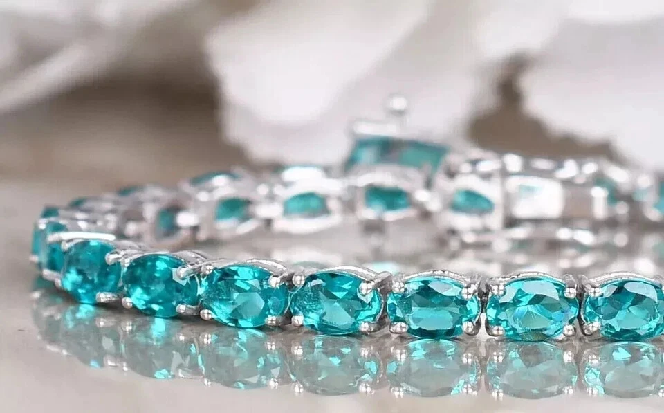 Brazalete Tenis Turmalina Paraiba Creado en Laboratorio Corte Ovalado 5CT Oro Blanco 14K Sobre Foto 2 de 4