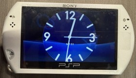 PSP GO PlayStation Portable White Game Console WITH STORAGE UPGRADE AND MORE