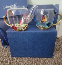 Teapot and cup with 2 spoons for coffee and tea with butterfly and flower decor!