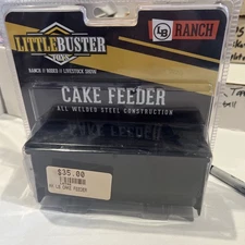 Little Buster Toys Black Metal Cake Feeder 1:16 Scale New Unopened