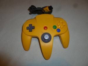 yellow nintendo 64 controller