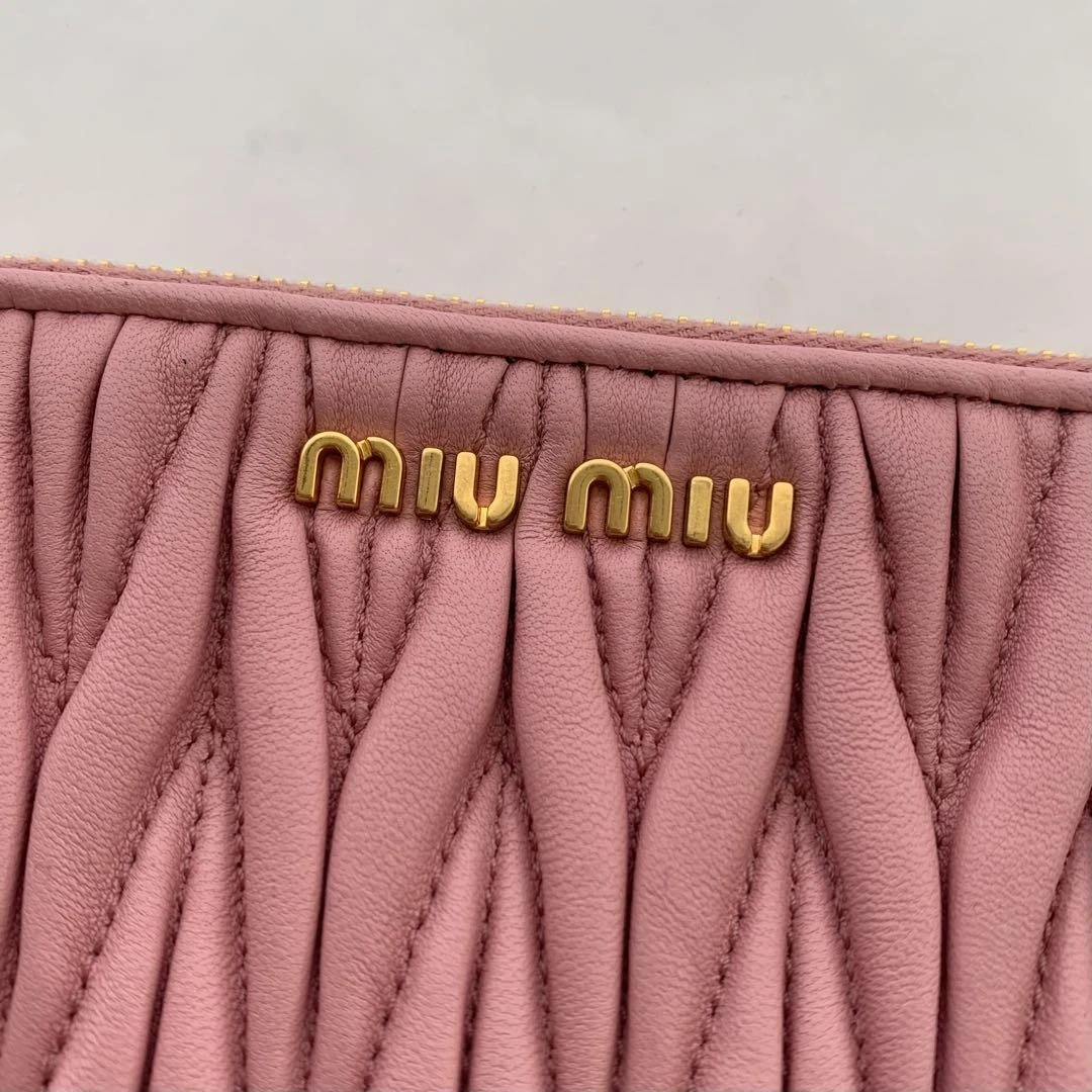 MIU MIU Pochette in pelle rosa matelassé elegante mini borsa trapuntata dal Giappone