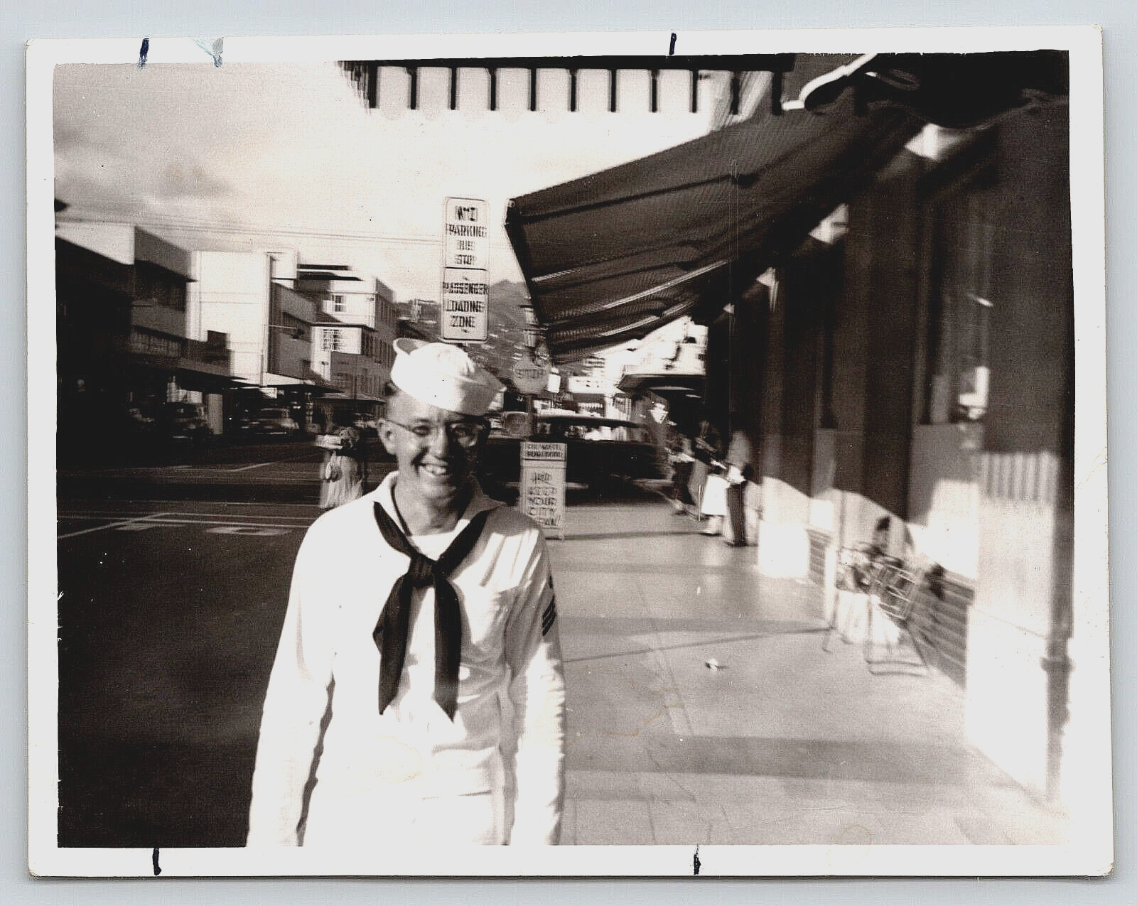 Vintage Old Photo of USA Navy Sailor in Uniform on City Road with Stores  
