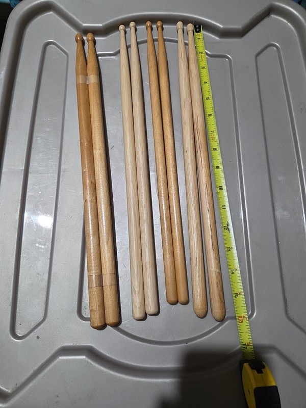 4 Pairs Of Drum Sticks.  Different Size. No Name. No Size