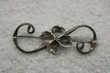 VINTAGE STUART NYE DOGWOOD  STERLING SILVER BROOCH PIN WITH SCROLL 