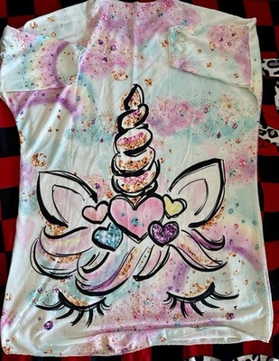 unicorn graphic t-shirt featuring glitter accents and hearts