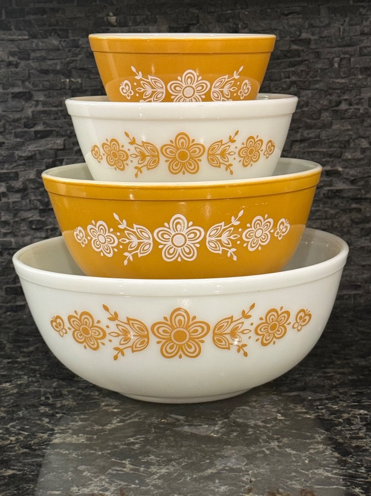 Set of four vintage Pyrex Butterfly Gold nesting mixing bowls