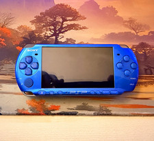 Sony PSP Slim Vivid Blue & 3 Game Bundle