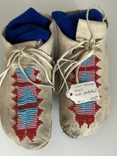 Hand-beaded hide moccasins with geometric patterns, Mid 20th Century or earlier